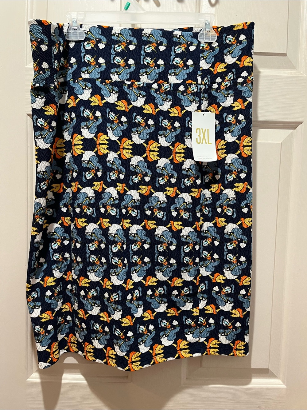 LuLaRoe 3XL Navy Blue Pencil Skirt with Yellow & Light Blue Cartoon Pattern